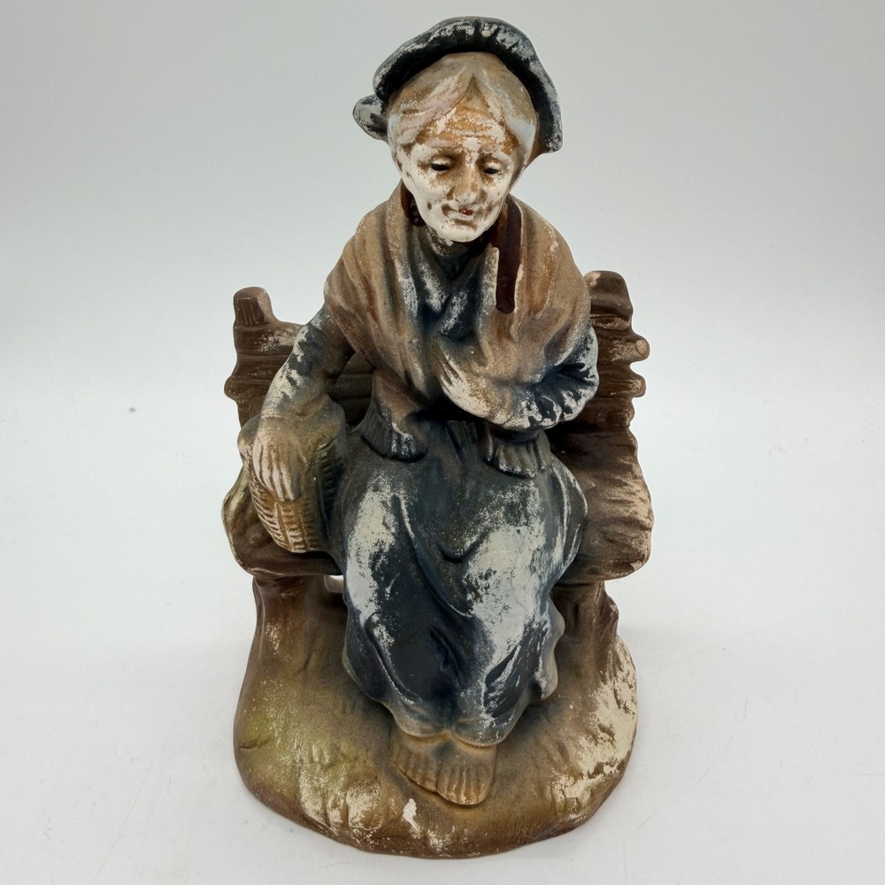 Vintage Trimo Ware Peasant Elderly Woman on Bench Figurine Basket Ceramic 6 1/2"